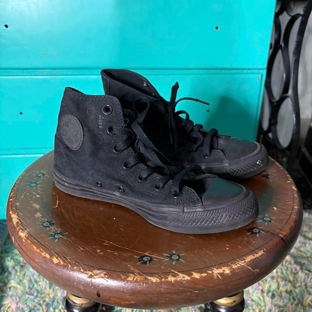 Black canvas high top Converse trainers